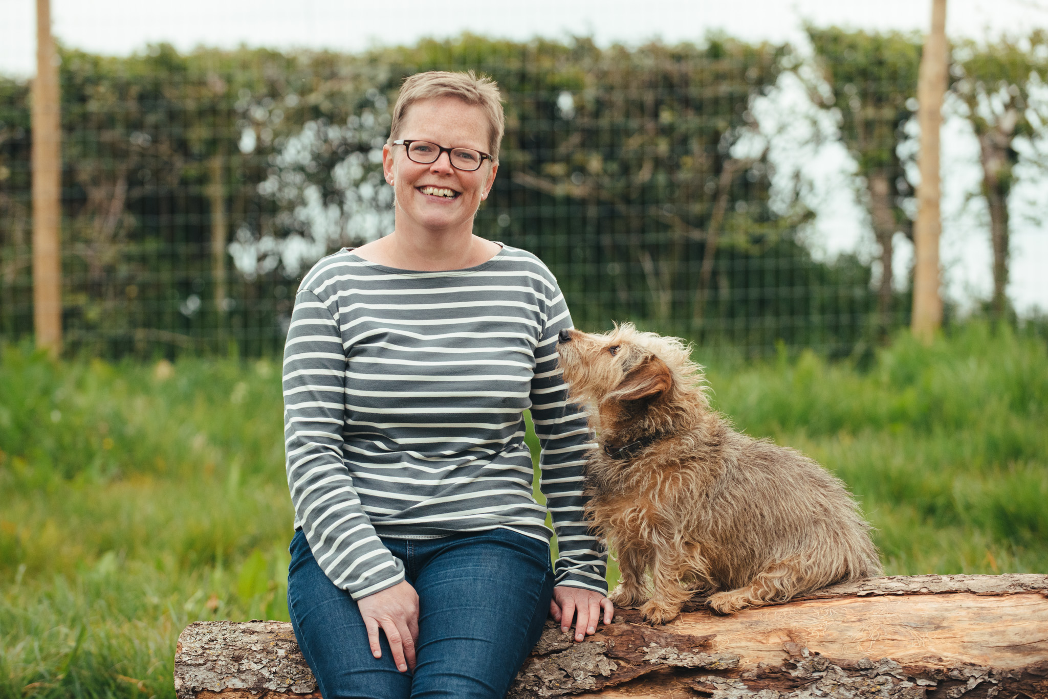 Nicky of Happy Paws Outdoors with Chip the dog